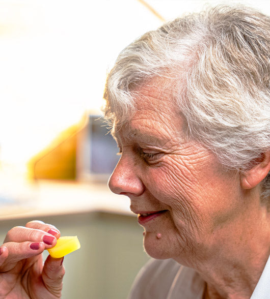 Woman With Dementia Eating Jelly Drops